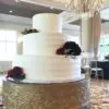 Rustic linear white wedding cake