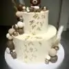 Bear themed baby shower cake with edible gold leaf