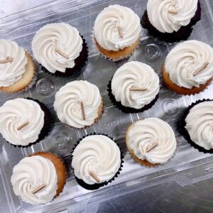 A sophisticated and white cupcake arrangement