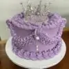 Lambeth themed cake with crown