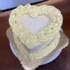 light yellow iced heart cake