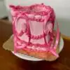2-Color lambeth heart with light pink / dark pink icing, edible glitter and pink ribbons