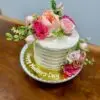 6" Rustic line with white icing and pink artificial flowers