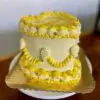 Heart lambeth 2-color with light yellow and yellow icing, gold sprinkles