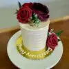 4" Rustic line with white icing and red artificial flowers