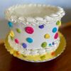 8" White cake with rainbow polka dots