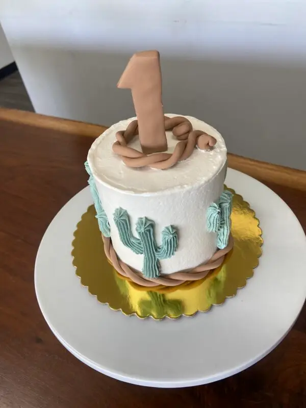 4" Rodeo theme with icing and fondant details and fondant number topper