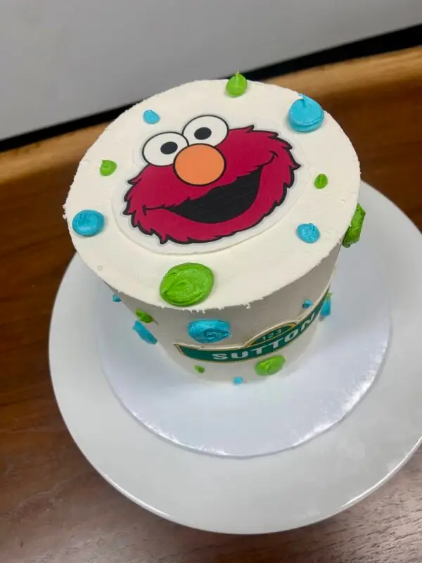 4" with icing polka dots and edible images