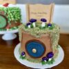 8" LOTR theme with fondant details and paper scroll topper