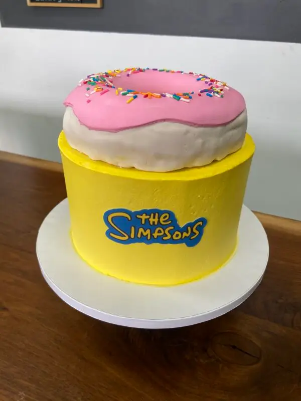 8" with edible image logo and fondant rice treat topper