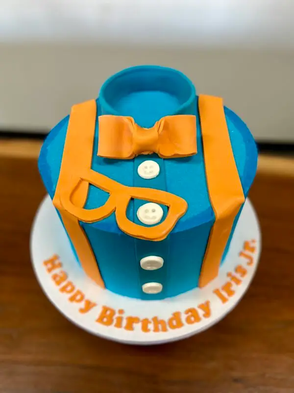 8" Blippi theme with fondant details and message on cake board