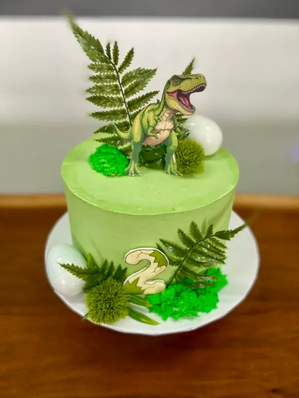 8" Dinosaur theme with edible image number, paper topper and artificial greenery