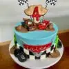 8" CARS theme with all fondant details, plastic cars, and paper flag toppers