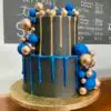 6"/8" with chocolate drip and plastic ball decorations