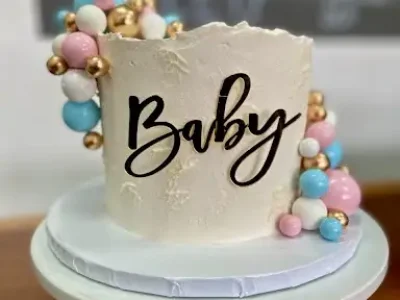 6" ALl icing texture with plastic toppers, and acrylic plaque