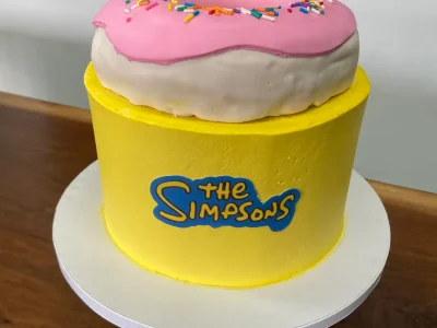 8" with edible image logo and fondant rice treat topper